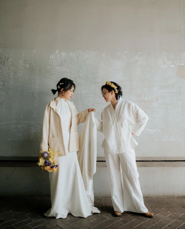 Capture your love story with @cjpicture_au on your dream team. Just take a look at how beautifully captured Melly & Nat’s wedding was!⁠
⁠
Meet Jeff, the J from CJ Picture, and his wife, Celeste – the C! With over ten years of experience in wedding photography, this dynamic duo is a force of nature.⁠
⁠
What sets them apart? Well, it's not just their beautiful photography that has captured the attention of many Australian couples, but the deep connection and love they bring to every wedding they capture. ⁠
⁠
When you choose CJ Picture, you're not just hiring photographers – you're gaining friends who genuinely care about capturing the most precious moments of your special day. ⁠
⁠
Ready to share your story? Click the link in our bio to learn more about them on the Polka Dot Directory! ⁠
⁠
psst!! If you're a wedding photographer/vendor looking to get more eyes on your portfolio – a Polka Dot Membership might be the thing for you. Find out more at the link in our bio.⁠
⁠
[Image one description: Standing in front of a grey wall, this couple are holding hands and sharing an intimate moment. The bride on the left is wearing a halter neck white gown with a beige jacket, holding a yellow bouquet in one hand and the train of her dress in the other. The other bride is wearing a white two-piece with wide-leg pants, a floral-patterned shirt, and a yellow flower crown.⁠
⁠
Image two description: Here, the couple are posing for the camera, Mel in her dress is leaning down to the camera while holding Nat's hip. Nat is holding the bouquet towards the camera.]⁠
⁠
⁠
#PolkaDotWedding #FeelGoodWeddings #AustralianWeddings #SydneyPhotographer #AustralianWedding #WeddingVendors #WeddingDirectory #WeddingWebsite #WeddingInspo #WeddingInspiration #WeddingBlogger