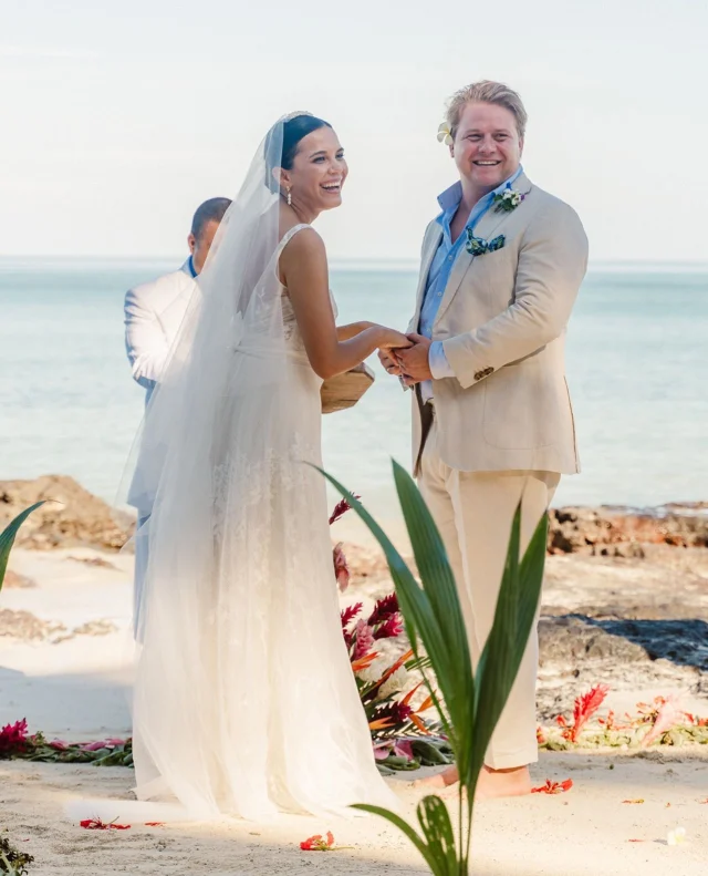 Sometimes a wedding is so much more than a celebration – it’s a homecoming, a tribute, a promise. Racheli and Will’s wedding on Turtle Island was all of that and more. ⁠
⁠
Surrounded by the wild beauty of Fiji and the people they love most, they honoured the past and stepped into their future. Their beautiful destination wedding is live now on Polka Dot Honeymoons, and it’s every bit as heartfelt and magical as you can imagine.⁠
⁠
Photographer: @islandencountersphoto / Venue: @turtlefiji / Wedding Cake: @turtlefiji / Wedding Planner: @turtlefiji / Flowers: @turtlefiji / Flowers: INWATU's Hiring & Decor / Bride's Dress: @lucia_josephine / Wedding Website & Digital Invitations: @theknot / Rentals & Decor: @turtlefiji / Rentals & Decor: @partyeventsfiji / Transport: @turtlefiji / Transport: @turtle_airways⁠
⁠
[Image one description: Hand-in-hand at their waterfront ceremony, this couple is looking out at their guests and laughing. The bride is wearing a fitted bodice white gown with a delicate, flowy skirt. The groom is wearing a natural-toned suit with a baby blue shirt and a flower behind his ear; he's also barefoot on the sand. The crystal blue ocean glitters endlessly behind them.⁠
⁠
Image two description: Still holding hands, the couple are now walking across the sand with huge smiles on their faces. Palm trees and other tropical foliage surround the beach  behind them.]⁠
⁠
⁠
#PolkaDotWedding #PolkaDotHoneymoons #FeelGoodWeddings #Honeymoon #HoneymoonIdeas #Honeymoons #Honeymooning #HoneymoonVibes #HoneymoonDiaries #LuxuryTravel #LuxuryHoneymoon #Travel #Travelling #TravelIdeas #DestinationWedding #FijianWedding #TurtleIsland