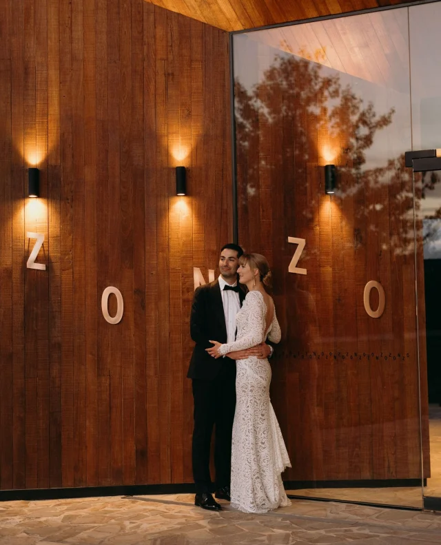 “For us, love is about compassion and supporting each other through both the good and bad times.” – @michael.khazinsky & @emma_scussel ⁠
⁠
What do you get when you mix summer sunshine, private vows, sparkling crystals, and a whole lot of heart?⁠
⁠
Emma and Michael's dreamy Yarra Valley winery wedding! Now live on Polka Dot Featured – come soak up the joy at the link in our bio.⁠
⁠
Photographer: @adaandivy_photography / Venue: @zonzoestate / Cinematographer: @momento_films / Flowers: @flowerpotdebbie / Wedding Ring: @adcdiamonds / Ceremony Officiant: Danielle Binaisse / DJ: @bradrowland82 / Photo Booth: @thephotoboothgirl / Wedding Cake: @yarravalleycakecompany / Transport: @enriklimousines / Transport: Bu Cadi Cars / Groom's Attire: @mjbale / Bride's Shoes: @baredfootwear / Bride's Veil/Hair Accessories: @madewithlovebridal / Bridal Robes: @lerose_online / Hair & Makeup Artist: @meganharrisonmakeup / Bride's Dress: @grace_loves_lace / Flowergirl's Attire: @oui.babe / Invitations & Stationery: @theparkereffect⁠
⁠
[Image one description: Standing in each other's arms at the entrance to Zonzo Estate, this pair of newlyweds is still wearing their ceremony clothing. A classic tux for the groom on the left and a lacey long-sleeve gown for the bride. ⁠
⁠
Image two description: A black and white shot of the bride getting ready, with her mother behind her fluffing out her pearl-encrusted veil. We have a better look at the intricate lacing of her high-neck gown here, with swirling patterns decorating the bodice. ⁠
⁠
Image three description: Back outside, the couple are now standing in the road that runs between two of the vineyards. They're nose to nose, with the bride's train flowing out behind her as she faces away from the camera to lean into her husband.]⁠
⁠
⁠
#PolkaDotWedding #FeelGoodWeddings #AustralianWeddings #AustralianWedding #WeddingStory #WeddingStories #WeddingMemories #WeddingInspiration #WeddingInspo #RealWedding #WineryWedding #VineyardWedding #ZonzoEstate #ZonzoWedding