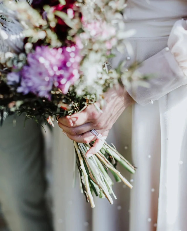 Elevate your wedding style with jewellery that is as unique as you are!⁠
⁠
@cheree_edwards_jewellery is the mastermind behind stunning, custom designs that blend traditional, handcrafted jewellery with modern technology.⁠
⁠
Find out more about her work on the Polka Dot Directory at the link in our bio!⁠
⁠
Calling all wedding vendors! A Polka Dot Membership might be the thing you need to level up your business – find all the deets at the link in bio.⁠
⁠
[Image description: A bride in a pearl-detailed dress is holding. abouquet full of purple and red florals, but the star of this shot is the ring stack the bride is wearing. With a large gemstone, the stack has three bands of sparkling silver rings.]⁠
⁠
⁠
#PolkaDotWedding #FeelGoodWeddings #AustralianWeddings #AustralianWedding #WeddingVendors #WeddingDirectory #WeddingWebsite #WeddingInspo #WeddingInspiration #WeddingBlogger #SustainableJewellery #CustomWeddingJewellery #WeddingJeweller